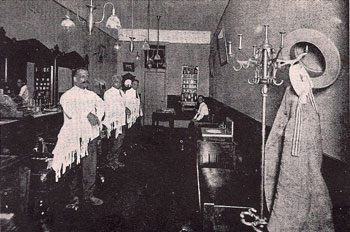 The interior of Henry Wade Robbins' Ann Arbor barber shop at 117 Ann St.