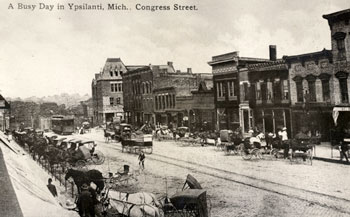 Michigan Avenue as it appeared when Mamie's husband Ed ran a butcher shop there. His shop would have been towards the far side of the block pictured.