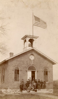 Though no picture exists in the Ypsilanti Archives of Fowler School, this look at Delhi School may give some idea of the appearance of Mamie's school. The flag appears to be the 45-star flag used from 1896-1908.