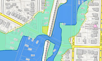 Knights market is the parcel highlighted in yellow. The flood plain is the green shaded area. The floodway is the blue shaded area.