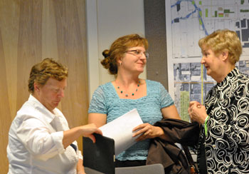 Left to right: DDA board member Sandi Smith, Ann Arbor Housing Commission executive director Jennifer L. Hall, and DDA board chair Leah Gunn.