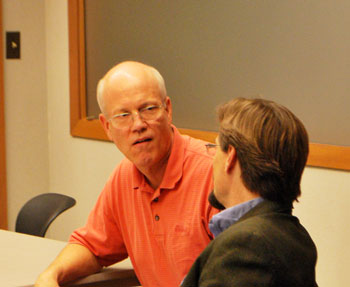 From left: Ypsilanti mayor Paul Schreiber and AATA board chair Charles Griffith chat before the meeting started.