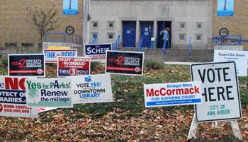 Campaign signs outside the polling location at Eberwhite Elementary School in Ann Arbor.