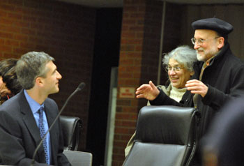 Residents Eleanor Linn and Marc Gerstein chat with Christopher Taylor before the meeting.