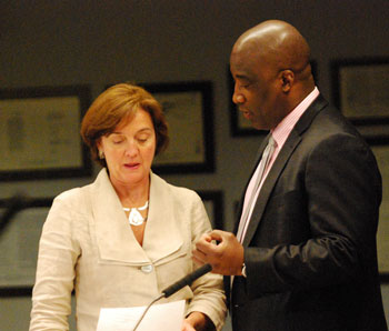 AATA board member Sue Gott and CEO Michael Ford talked before the start of the May 16, 2013 meeting.