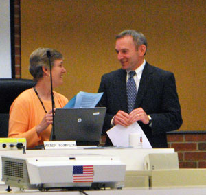 Attorny Mark Merlanti talked with city of Ann Arbor planning manager Wendy Rampson before the meeting started.