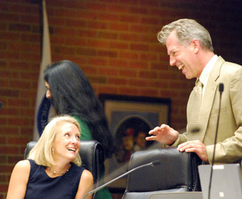 Sally Petersen (Ward 2) and Stephen Kunselman (Ward 3) share a laugh before the meeting started.