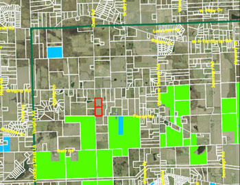 The Sheldon and Wolf property is indicated in red. The green highlighted area denotes area already protected as a part of Ann Arbor's greenbelt program. The heavy green line is the boundary encompassing eligible properties. This is the northwest corner of the boundary area.