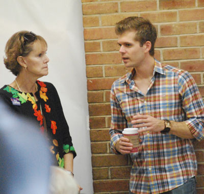 Resident Kathy Griswold talks with Michigan state representative Adam Zemke (D-55)