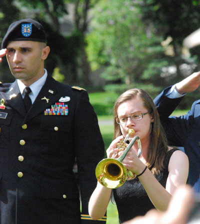 Lorna Barron, who plays trumpet in the Huron High School band, performed Taps.