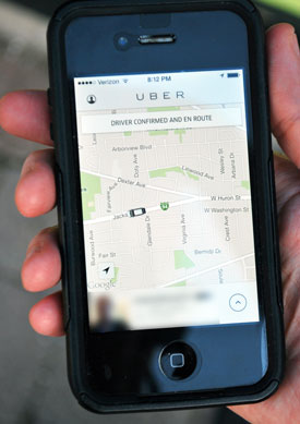 Screen of iPhone showing Uber vehicle responding to request for a pickup on May 24. The resulting trip – from Jackson & Maple to Liberty & Main was calculated by Uber as $8. With the current introductory promotion it cost nothing.