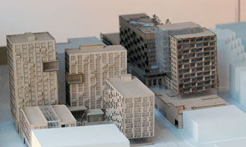 A 3-D model currently displayed on a table just outside the elevator landing of city hall. It reflects the work of University of Michigan students in a course taught by professor of architecture and urban planning Doug Kelbaugh. This view is looking north, with the conceived development for the Brown block to the left of the frame.
