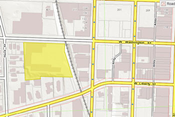 The city-owed 415 W. Washington parcel is highlighted in yellow.