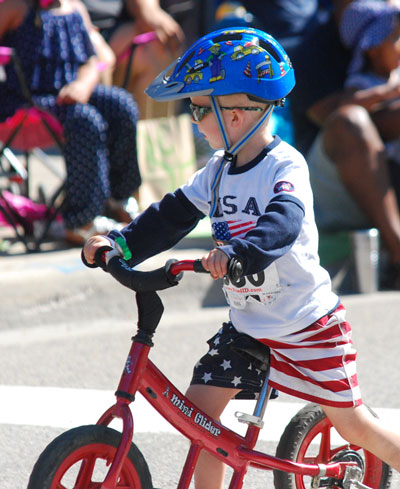 Cute kid on bike.