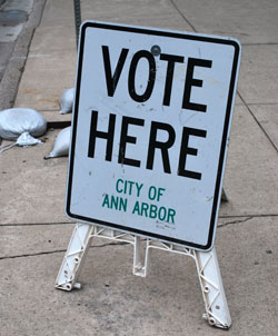 "Vote Here" sign designating an Ann Arbor polling location for a previous election.