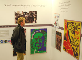 Labadie Collection curator Julie Herrada's favorite piece in the exhibit is the poster the far right:  