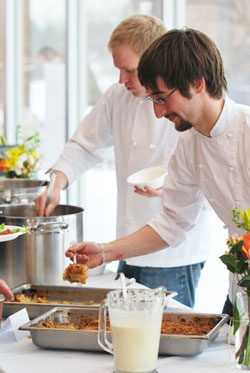 A Knife's Work partners Jay serves soup and Brendan serves apple cobbler