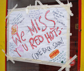 Sign on the outside of Red Hot Lovers.