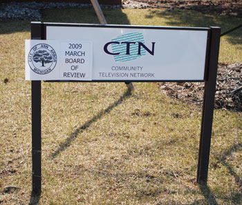 This temporary sign on the permanent Community Television Network sign is guiding hundreds of residents to the Board of Review.