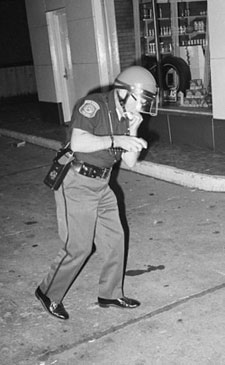 June 17, 1969: An injured officer after having been hit by a projectile. (Photo courtesy of Jay Cassidy.)