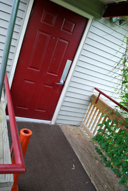 door to which a wheelchair ramp leads