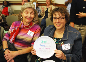 Mimi Harris, left, and Randi Friedman came to Wednesdays county board meeting to support funding for human services. They are board members for the Interfaith Hospitality Network, which runs Alpha House, a homeless shelter for families.