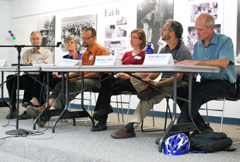 Panelists at the Sept. 23 Michigan Peaceworks forum on the local economy, from the left: Tom Weisskopf, University of Michigan economics professor; Ellen Clement, Corner Health Center executive director; Jeff McCabe, People's Food Co-Op board member; Lisa Dugdale, Transition Ann Arbor; Michael Appel, Avalon Housing executive director; John Hieftje, mayor of Ann Arbor.