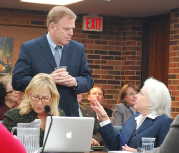 Tom Kinnear talks with University of Michigan regent Julia Darlow.
