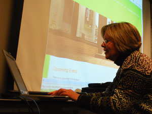 Cathy Gendron works on a presentation of public art websites from other cities.