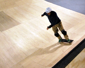 John Roos on a skateboard.