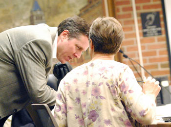 City of Ann Arbor CFO Tom Crawford confers with Margie Teall (Ward 4) before the meeting.
