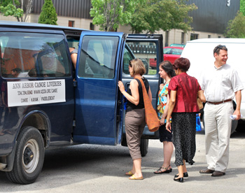 Planning commissioners board a canoe livery van on their tour of the South State Street corridor