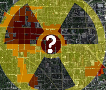 Components of this graphic include the D1 zoned areas of downtown Ann Arbor (darker red), D2 zoned areas (orangish), the symbol for radioactivity and a question mark. The characterization of Ann Arbor as radioactive for development was cheered at a public meeting by some residents who'd prefer to see smaller-scale growth, if any.  